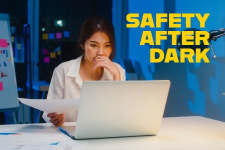 Woman sitting at computer to represent safety after dark