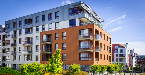 Walkway leading along the new colorful cmplex of apartment buildings, Gdansk, Poland